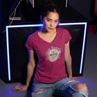 a woman wearing a red v neck shirt with a golden retriever dog drawing on the front