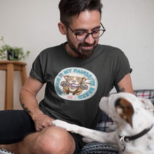 Load image into Gallery viewer, am man sitting with his dog wearing a  black T-Shirt by Canvas featuring the original Red Nose Pitbull artwork by OMG You're Home! Part of the "Rescue is my favorite breed" collection.