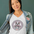 a women in a heather grey v-neck shirt featuring the OMG You're Home Boston Terrier dog design with Rescue is my favorite breed in pink letters