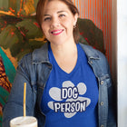 dog person design on a blue v-neck t-shirt for women dog lovers