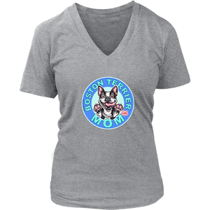 A women's light grey v-neck shirt from OMG You're Home! with the Boston Terrier dog Mom design on the front in blue letters