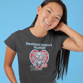 Smiling woman wearing a dark grey t-shirt with the OMG You're HOME! Emotional Support Human for my Blue Nose Pitbull design on the front