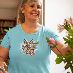 a smiling woman wearing a teal Next Level Womens Triblend shirt featuring the OMG You're Home German Shepherd dog design on the front in full color. 