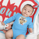 a baby in a blue long-sleeve onesie featuring the original happy and excited Golden Retriever on the front