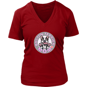 A women's red v-neck shirt from OMG You're Home! with the Boston Terrier dog Mom design on the front in pink letters