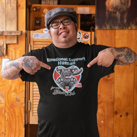 man pointing to his black OMG You're Home t-shirt featuring the Emotional Support Human for my Black Lab design on the front in full color